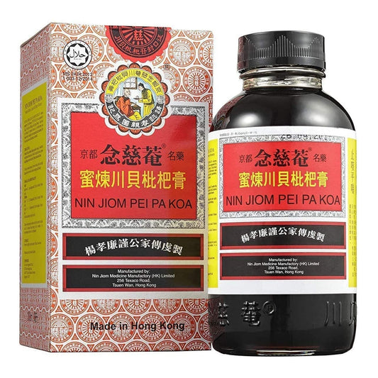 Bottle of syrup, with chinese and english text.
